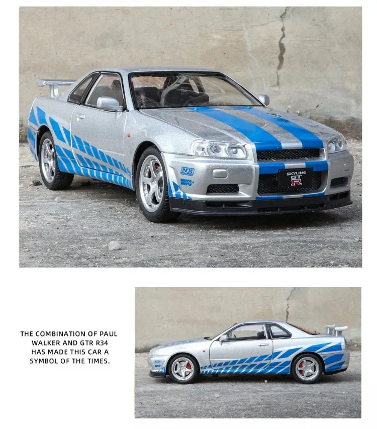 Silver and blue sports car with racing stripes on a concrete surface.